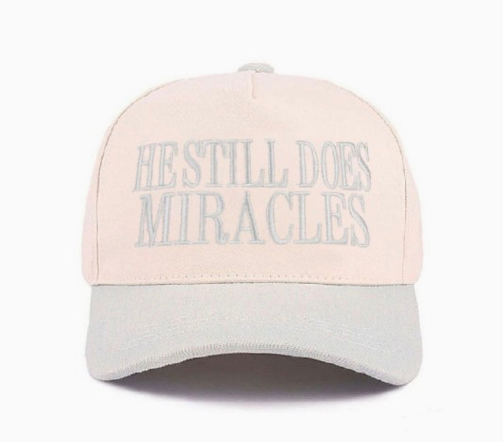 He Still Does Miracles Trucker Hat